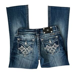 Miss Me Mid Rise Raw Hem Bootcut Jeans